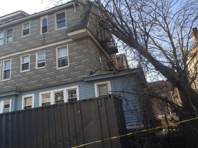 Fallen Tree Damages Multi-Family Building