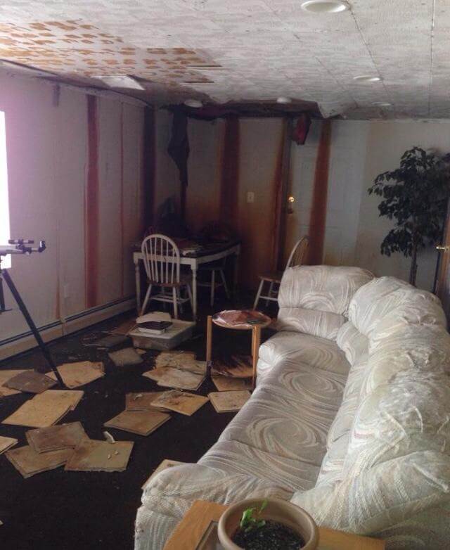 view of home with water damage in living room