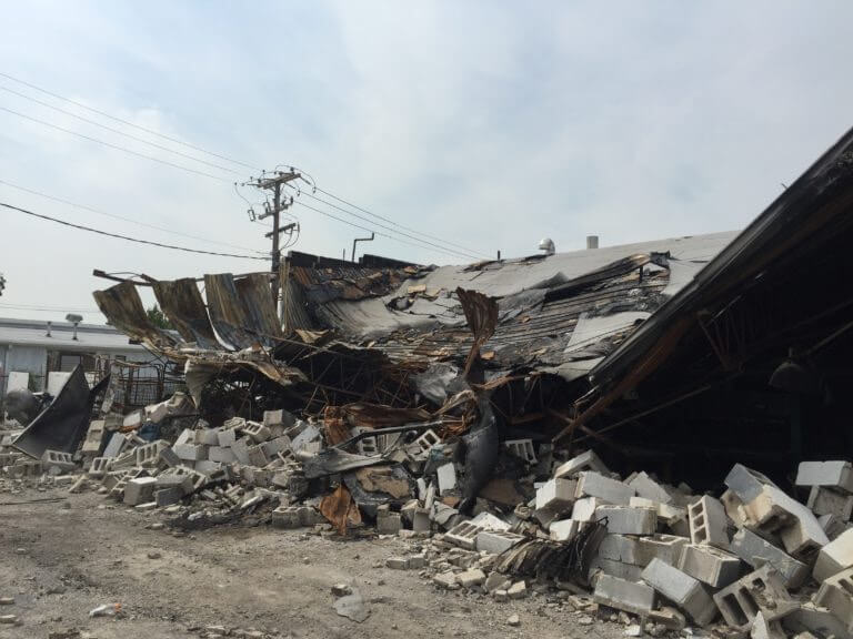 exterior view of demolished building from fire damage, locatedin Farmingdale