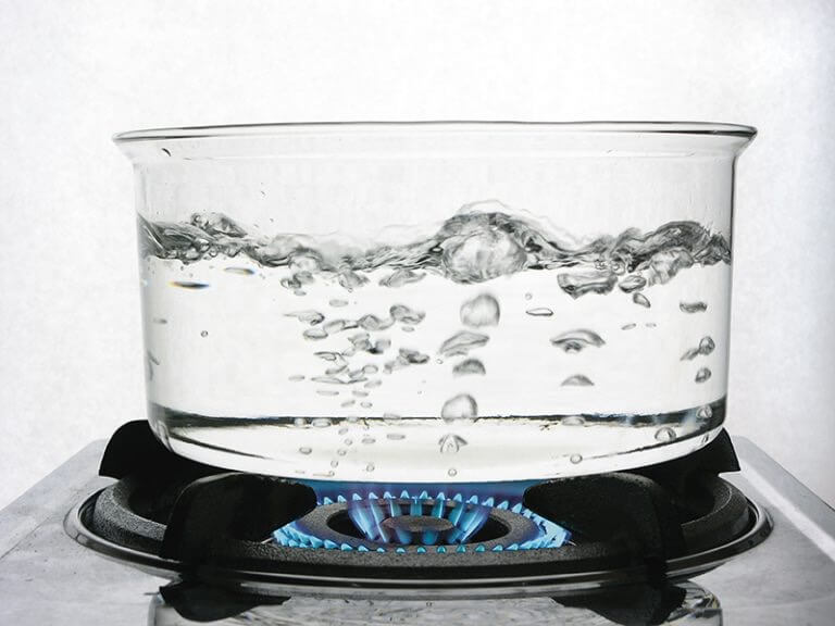 picture of water boiling on stove top