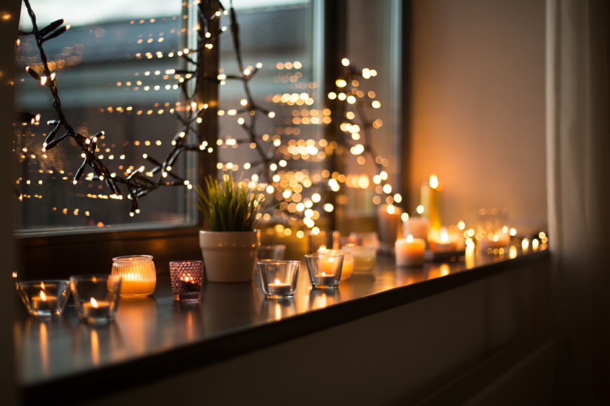 Candles near window